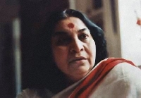 Shri Mataji Nirmala Devi indoors, red bordered white sari
