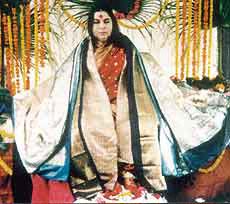 Mata Nirmala Devi decorated with saris