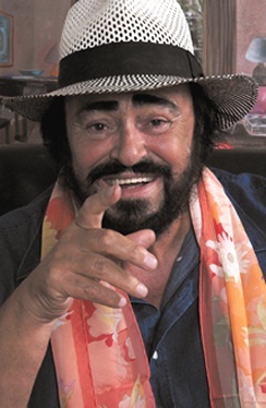 Luciano Pavarotti with scarf and hat