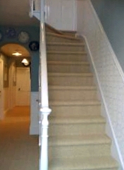 carpeted domestic hall and stairs