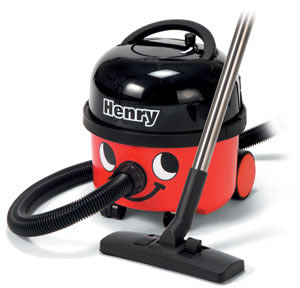 black and red canister cleaner, with big smile, called Henry