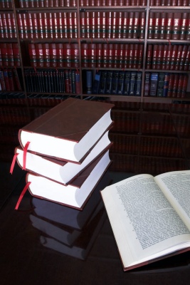 legal books on table and in bookcase