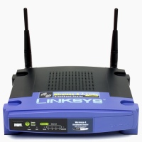 black and blue wireless router box with Linksys logo, status light panel and two aerials