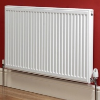 single white radiator with inline thermostat